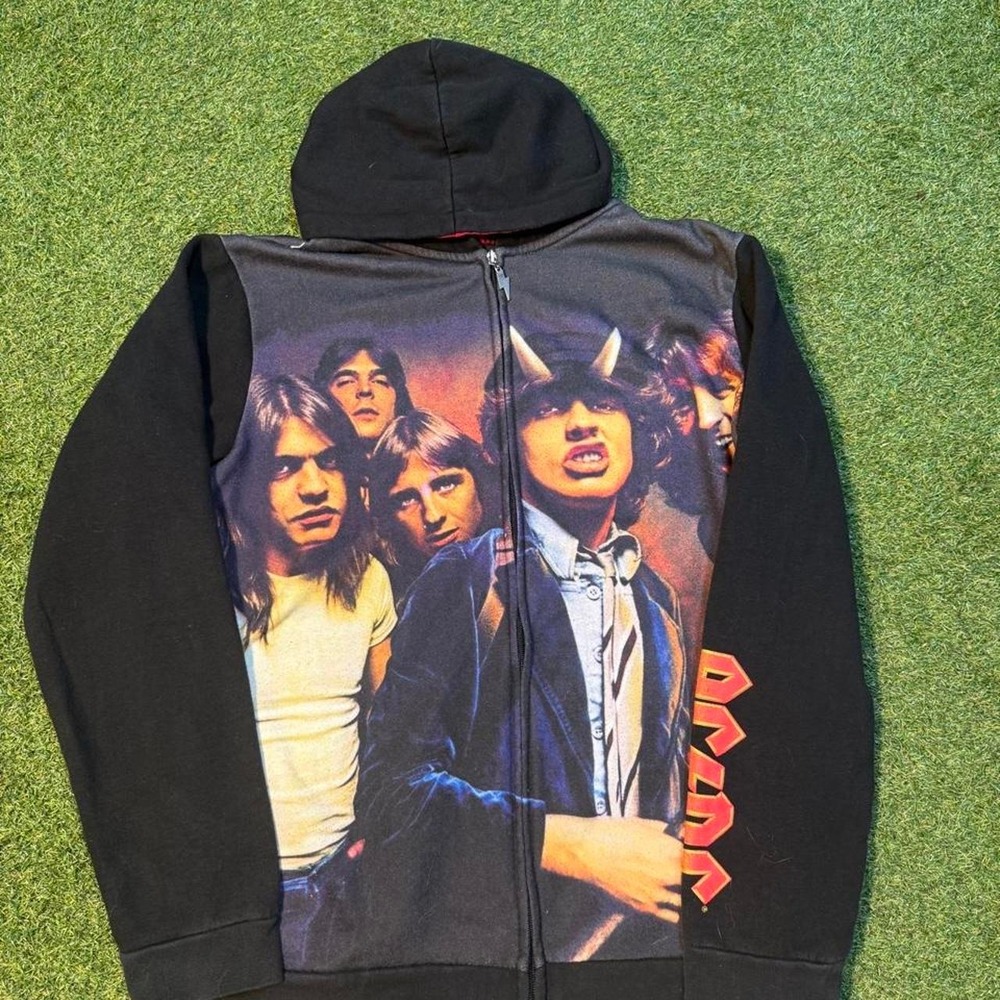 AC/DC band hoodie with graphic of band members and red 'AC/DC' text on sleeve
